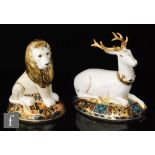 Two boxed Royal Crown Derby paperweights comprising Heraldic Lion, numbered 772 from a limited