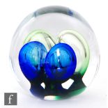 A Studio Ahus glass sculpture of ovoid, form internally decorated with four green and colbalt