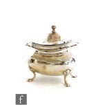 A hallmarked silver tea caddy of plain boat shaped form raised on four pad feet, weight 8.5oz,