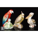 Three boxed Royal Crown Derby paperweights comprising Citron Cockatoo, Scarlett Macaw and White