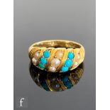 An early 20th Century 18ct turquoise and seed pearl set ring, alternating rows of stones to ribbed