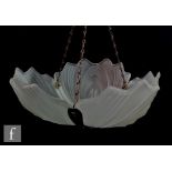 A 1930s Art Deco glass ceiling light fittings of scalloped shell form, with chromed frame, height