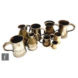 A 19th Century quart pewter tankard with Cork makers mark, a one pint jug measure, a Victorian pot