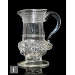 An 18th Century cream jug circa 1780, the waisted baluster form body decorated with fine threading