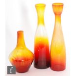 A near pair of mid 20th Century Czechoslovakian Garnet glass vases by Jan Gabrhel for Chlum u