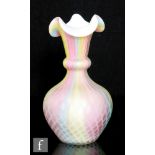 A late 19th Century Stevens & Williams rainbow air-trap satin glass vase, of onion form with bulbous