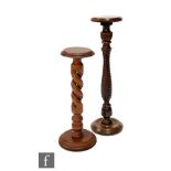 Two late 20th Century hardwood jardiniere stands or torcheres, with spiral columns over stepped