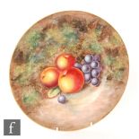 A later 20th Century Royal Worcester Fallen Fruits wall plate decorated J. Cook with hand painted