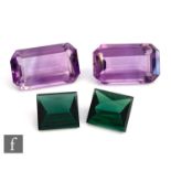 A pair of loose emerald cut and polished amethyst stones, length 19.7mm, width 11.7mm and depth 8.