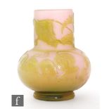 An early 20th century small Galle cameo glass vase of squat ovoid form with tall collar neck,