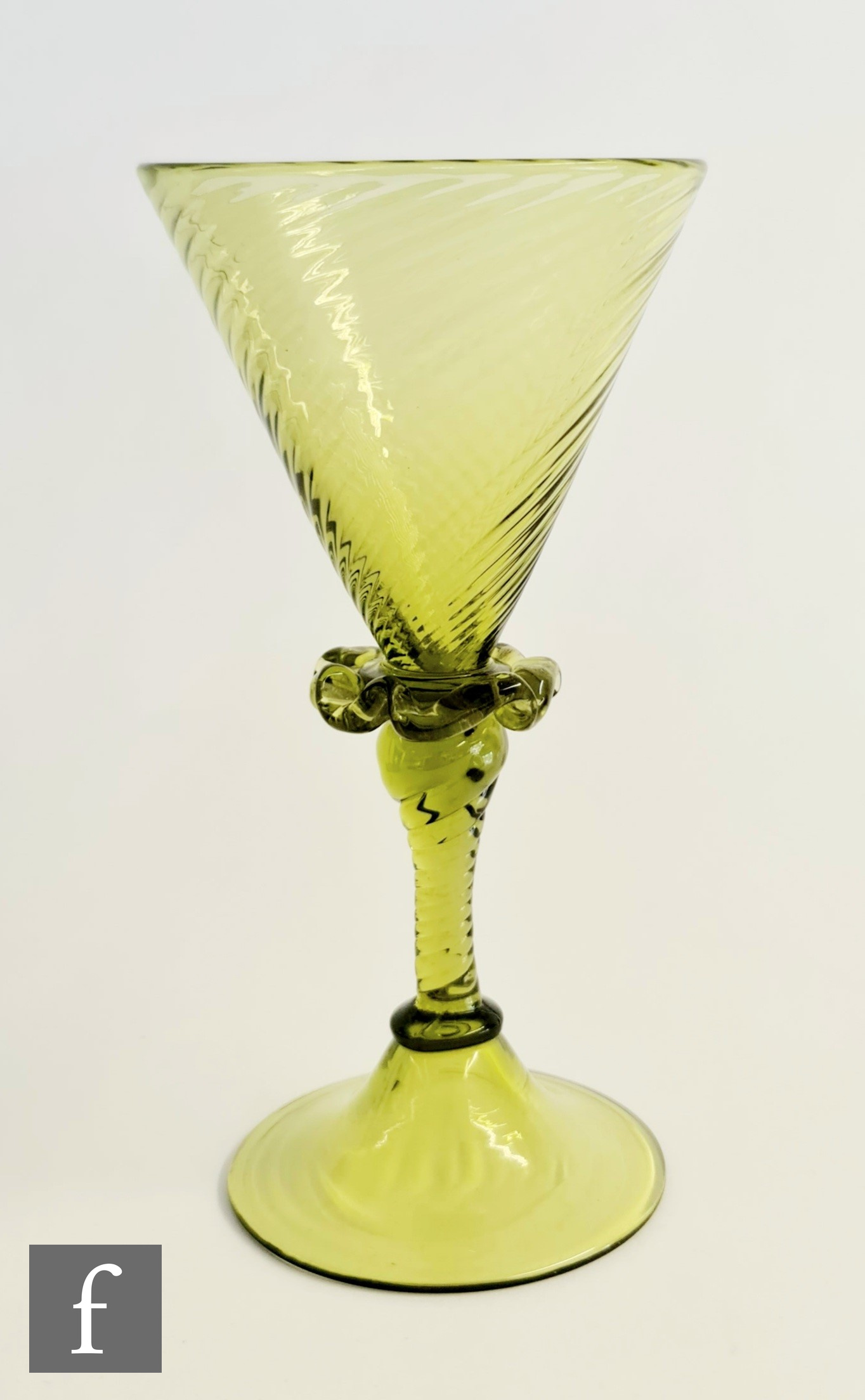 A 19th Century continental wine glass, the wrythen moulded conical bowl above a frill collar and a