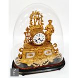 A late 19th Century French gilt mantle clock, the circular enamelled dial named Gve Levy a Rouen,