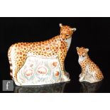 Two boxed Royal Crown Derby paperweights comprising Cheetah and Cheetah Cub, both with gold