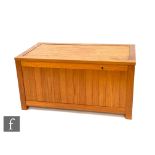 A 1970s teak blanket chest of lath panelled construction, with fitted tray compartment to the