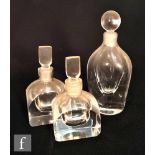 Three 20th century Orrefors glass scent bottles, the first of compressed ovoid form with globe