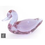 A 20th Century Italian Murano glass sculpture of a stylised duck by Zanetti, all in a pale green