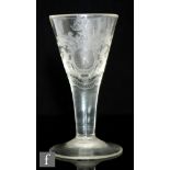 An early 18th Century Potsdam engraved goblet circa 1720, the drawn trumpet bowl with a finely