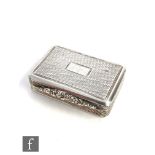 A hallmarked silver rectangular vinaigrette with engine turned decoration and raised floral thumb