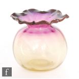 A late 19th Century Thomas Webb & Sons Alexandrite posy vase of ovoid form with optic ribbing