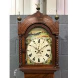 A 19th Century mahogany longcase clock with an eight-day movement striking on a bell, the hood
