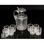 A late 19th Century Stevens & Williams clear crystal glass liqueur set comprising shouldered