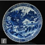 A Chinese blue and white dish, Kangxi six-character mark to base (1661-1722), the scalloped rim dish