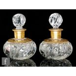 A pair of French Charles X glass cologne or scent bottles by Baccarat, circa 1830, each of squat