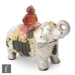 A Vallerysthal pressed glass box modelled as an elephant and its rider, with silver and red gilded
