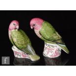 A boxed pair of Royal Crown Derby paperweights modelled as lovebirds from the Platinum Wedding