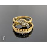 Two early to mid 20th Century 18ct ring, a diamond five stone and a three stone set to a slight