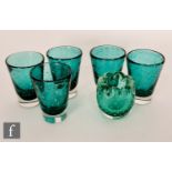 A set of five post war Italian Murano drinking glasses of conical form cased in clear crystal over