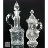 An early 19th Century clear crystal glass vinaigrette bottle of shouldered form with slender neck,