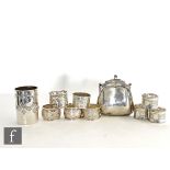A small parcel lot of silver items to include five napkin rings, a scent bottle sleeve, an evening