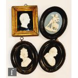 A pair of 18th Century relief moulded portrait panels in the manner of Wedgwood depicting King