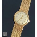 A 9ct hallmarked lady's Eterna-Matic, automatic wrist watch, batons to a silvered circular dial,