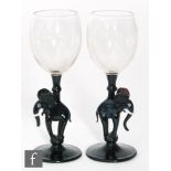 A pair of early 20th Century Bimini glasses, the round funnel bowls above stems modelled as stylised