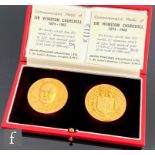 A cased pair of hallmarked 22ct Sir Winston Churchill (1874-1965) Commemorative Medals each with