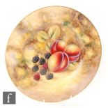 A later 20th Century Royal Worcester Fallen Fruits wall plate decorated by J. Smith with hand