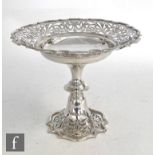 A hallmarked silver pedestal bowl with shaped circular foot with pierced decoration below knopped