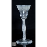 An 18th Century Jacobite drinking glass circa 1755, large pan top bowl engraved to the upper