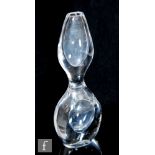 A mid 20th Century Swedish Kosta glass orchid vase designed by Vicke Lindstrand, of compressed