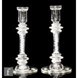A pair of 18th Century style glass candle sticks, three ringed annulated knops above single series