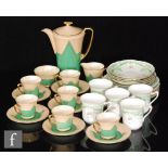 A 1930s Art Deco Crown Devon Fieldings coffee set comprising a coffee pot, six cans and saucers, a