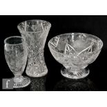 A 20th Century Tudor Crystal glass vase of footed swollen form decorated in the Ribbon & Rose design