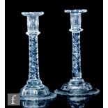 A pair of late 18th Century taper sticks circa 1790, with facet cut sconce above a diamond facet