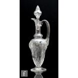 A large early 20th Century Stevens and Williams clear crystal claret jug by Joshua Hodgetts, pattern