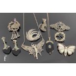 Nine items of modern silver marcasite set jewellery to include six brooches, two pendants and a pair