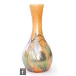 A large later 20th Century Okra glass vase of swollen skittle form decorated in the Samarkand