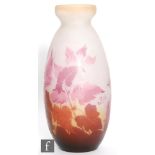 An early 20th Century Galle cameo glass vase circa 1900, of ovoid form with flared rim, cased in