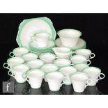 A collection of assorted 1930s Shelley Regent shaped teawares comprising sixteen cups, seventeen